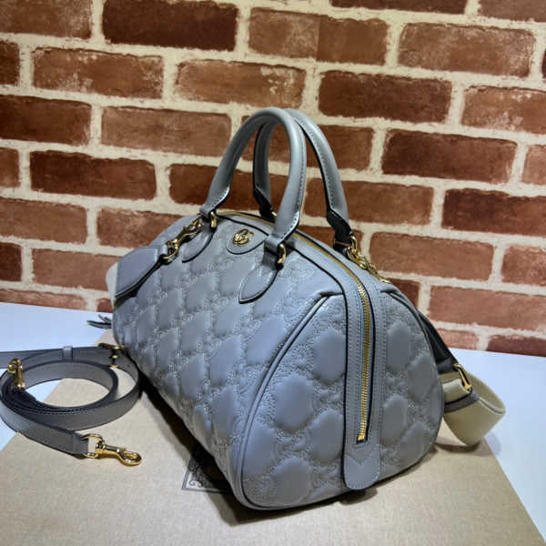 G*u*i gg matelassé leather top handle bag