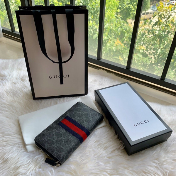 G*u*i leather zip around wallet