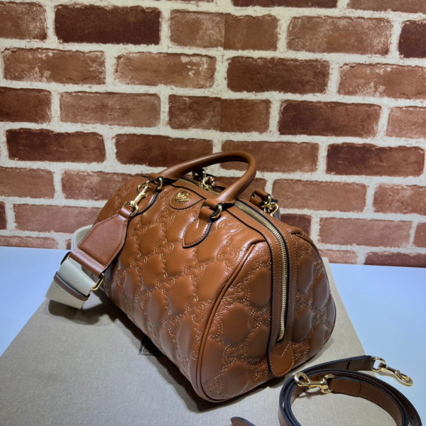 G*u*i gg matelassé leather top handle bag