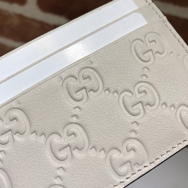 G*u*i signature card case