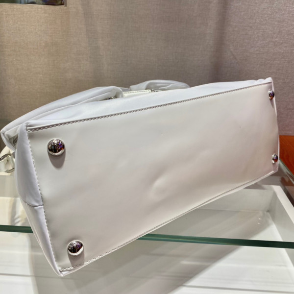 Pra*a signaux nylon and leather hobo bag