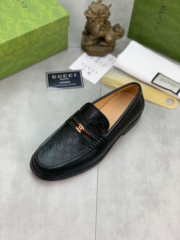 G*u*i loafers