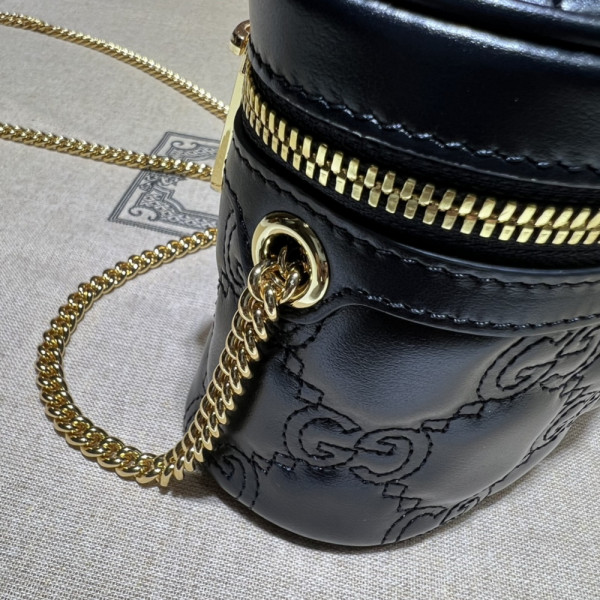 G*u*i gg matelassé top handle mini bag