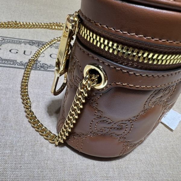 G*u*i gg matelassé top handle mini bag