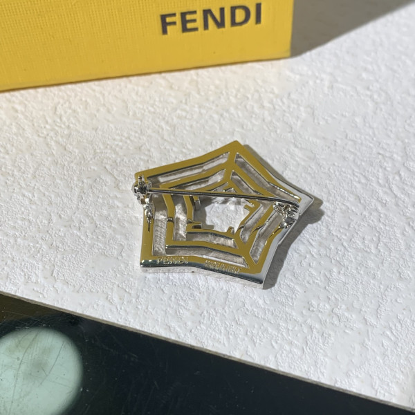 F**di brooch
