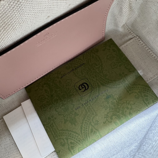 G*u*i gg matelassé leather top handle bag