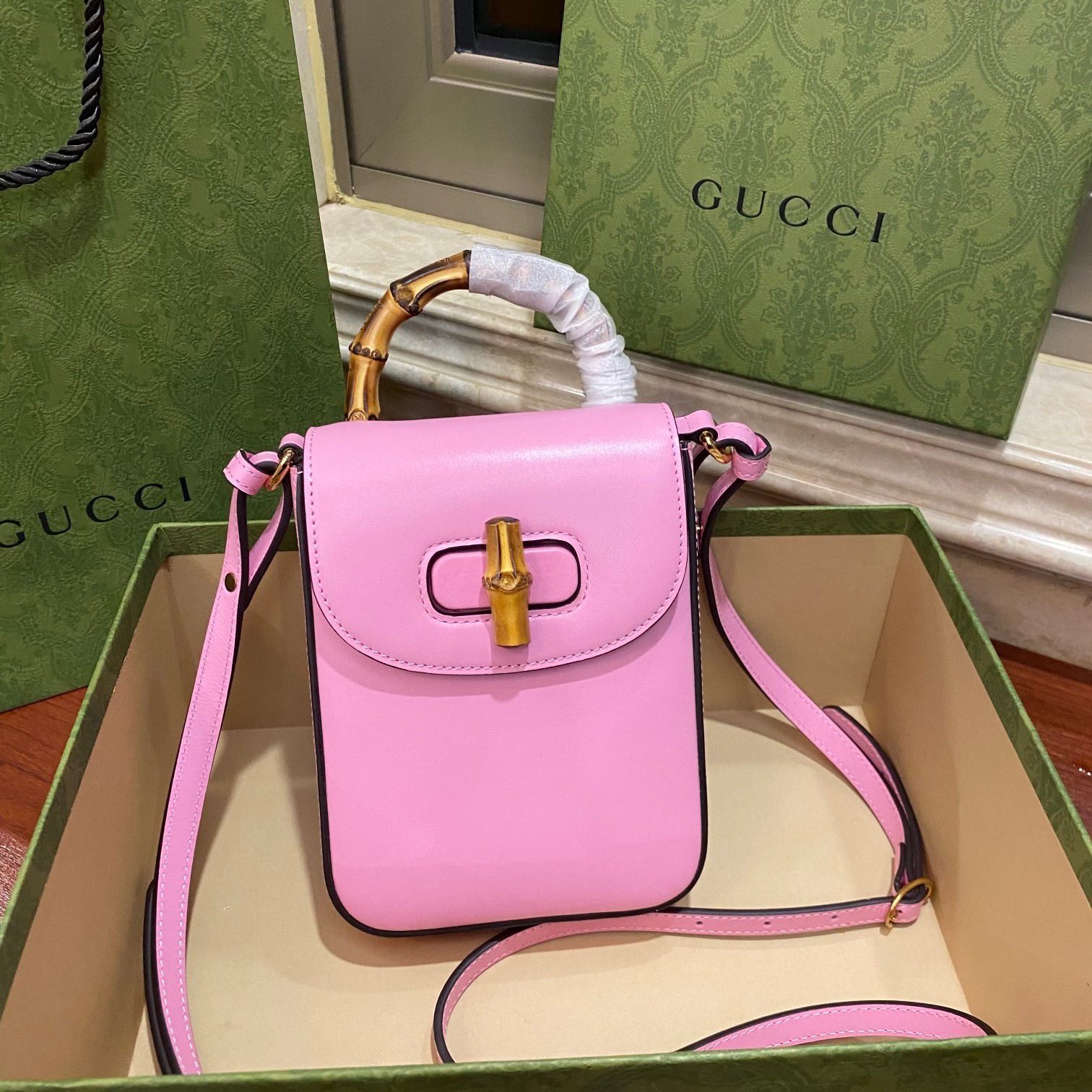 G*u*i bamboo mini handbag