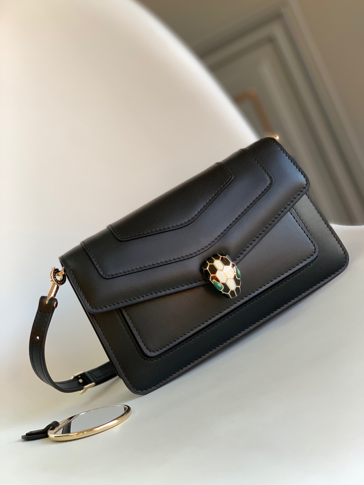 B*l*ai serpenti forever east-west shoulder bag