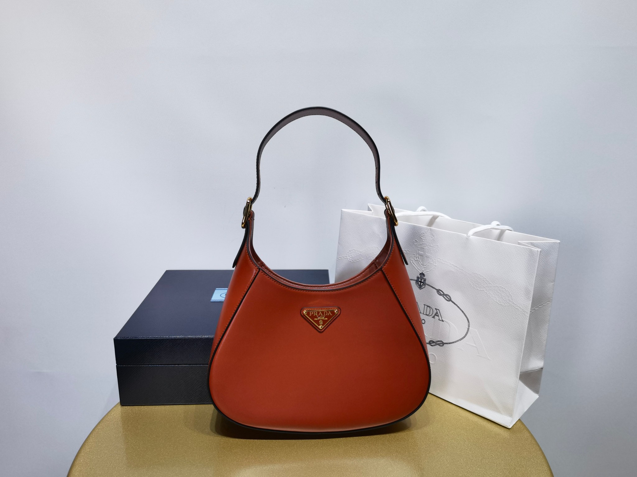 Pra*a leather shoulder bag