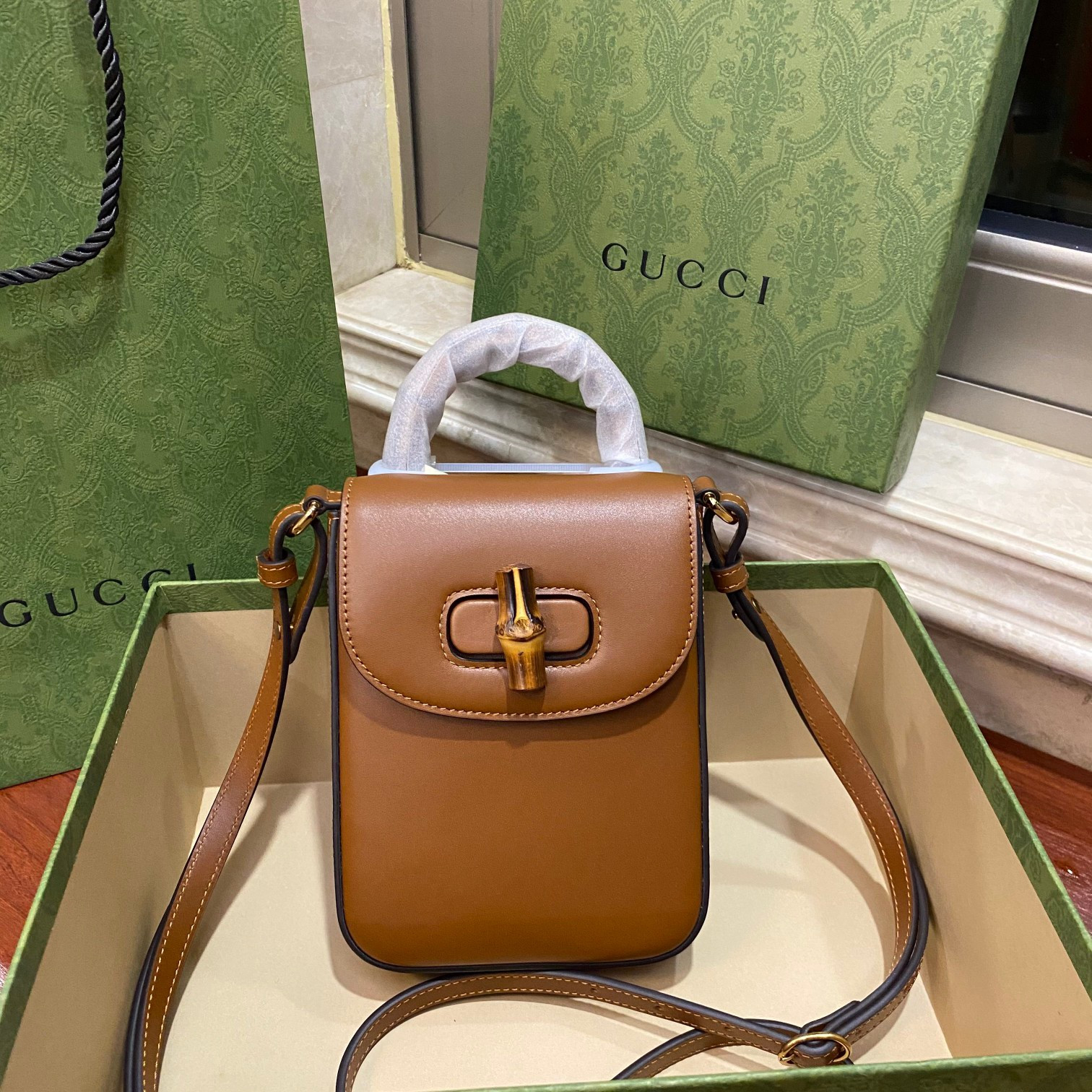 G*u*i bamboo mini handbag