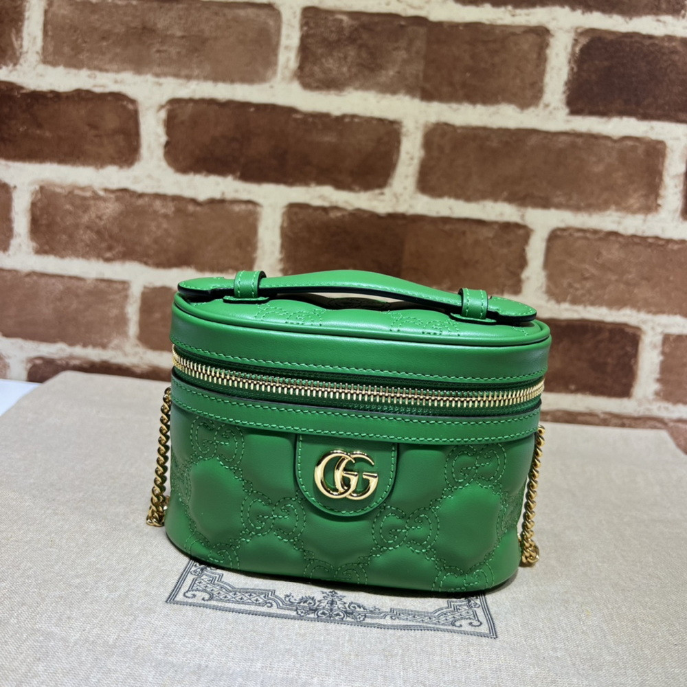 G*u*i gg matelassé top handle mini bag