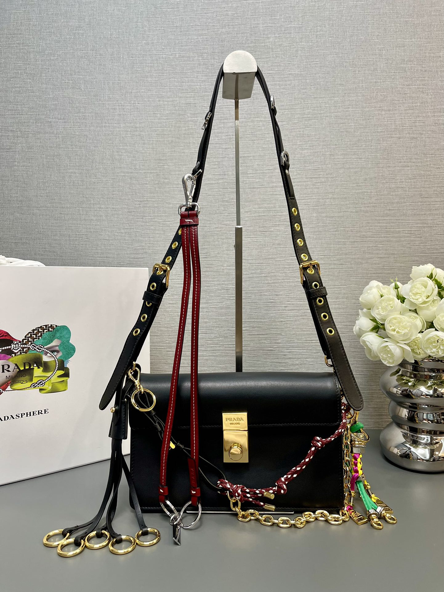 Pra*a soft sound small leather shoulder bag with charms