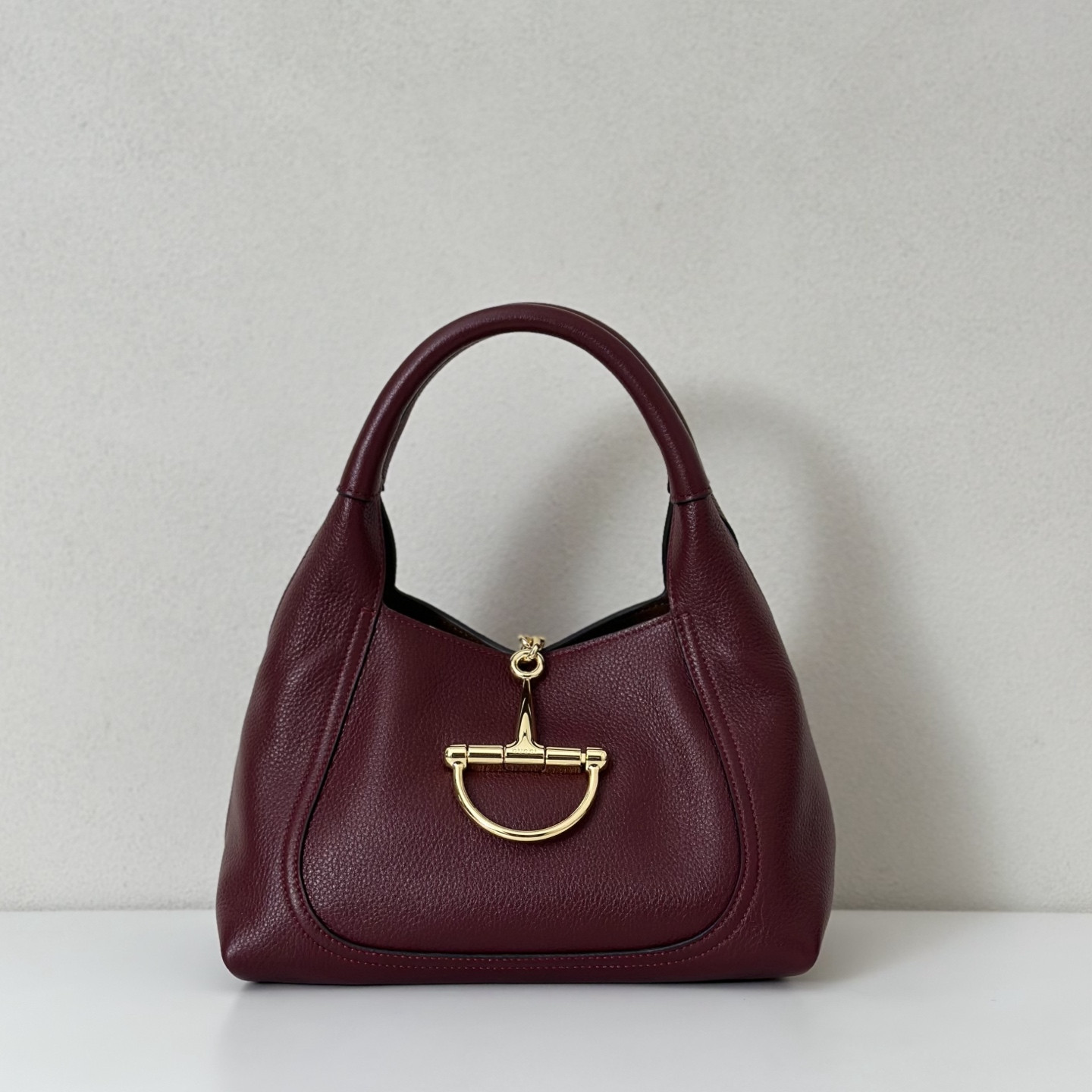 G*u*i softbit medium top handle bag