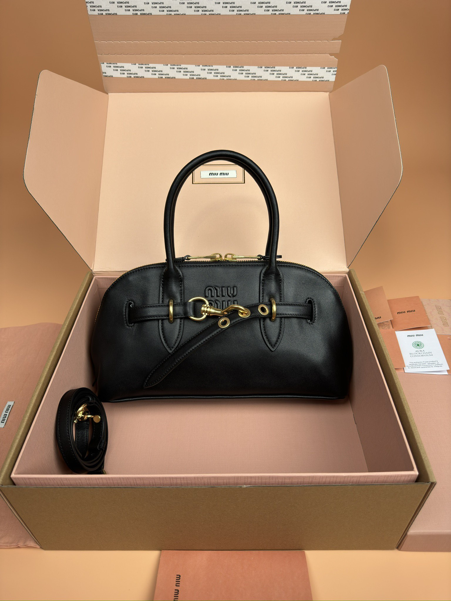 M*um*u aventure nappa leather top-handle bag